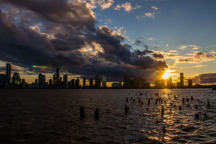 A photo of a sunset in lower Manhattan